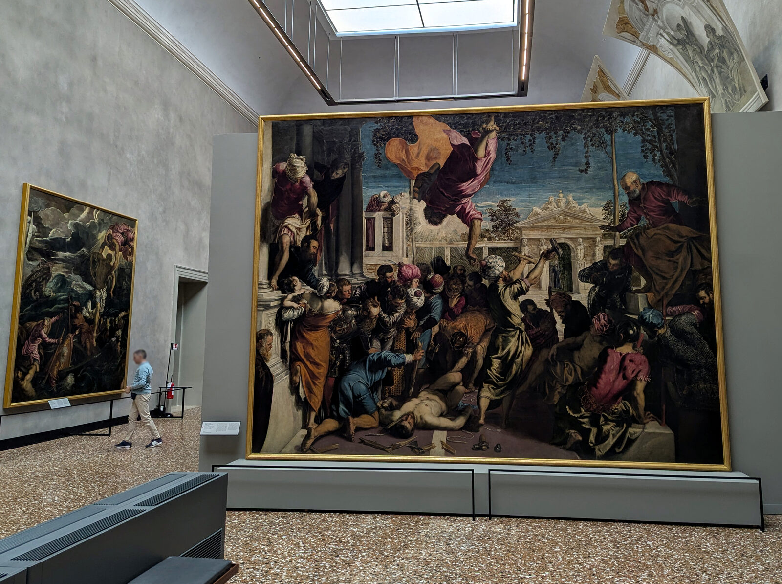 Accademia Galleries : Tintoretto's Saint Mark Rescuing the Slave (1548), originally painted for Scuola Grande di San Marco, depicts the evangelist swooping into the scene mid-flight and shattering the instruments of torture to save a devoted slave from martyrdom