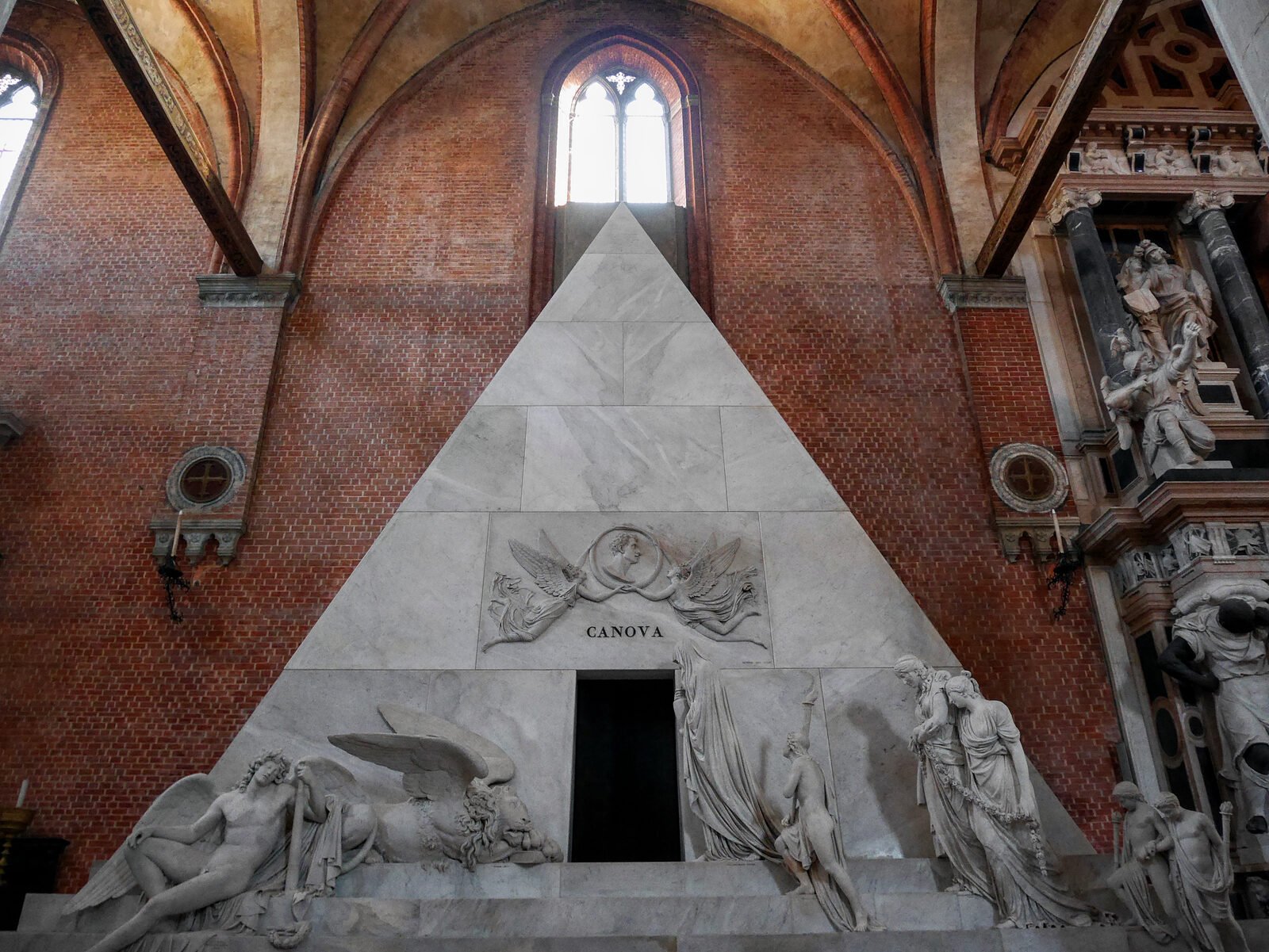 Basilica dei Frari : Canova's mausoleum is perhaps the most distinctive monument among the many within this vast church