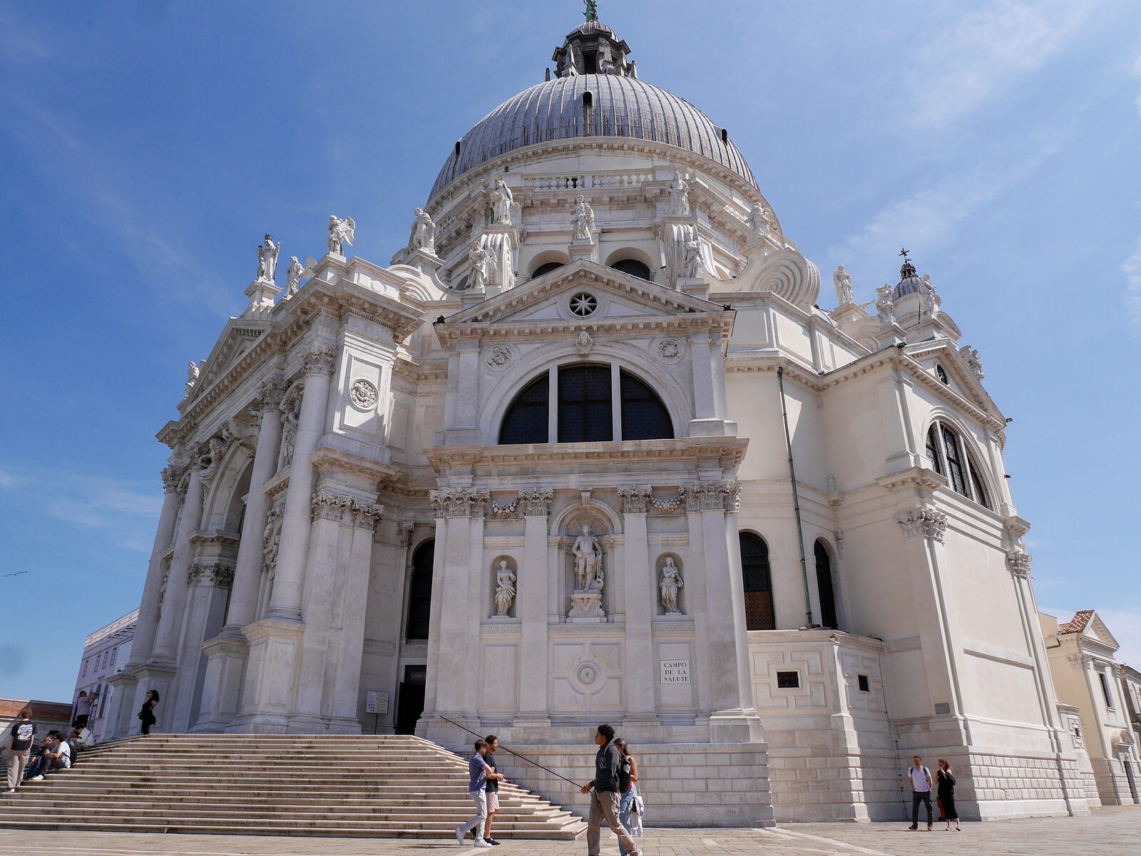 La Salute : Its sheer scale and dazzling white facade make it nearly blinding under the midday sun