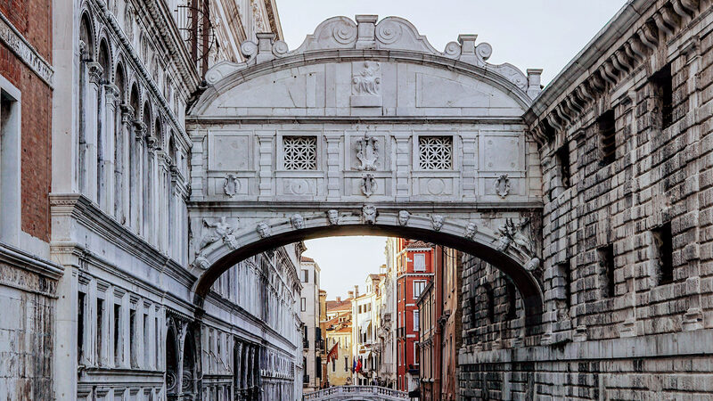 Bridge of Sighs : The bridge connects the Doge's Palace, on the left, to the new prisons, on the right - as seen from the always-crowded Ponte della Paglia viewpoint