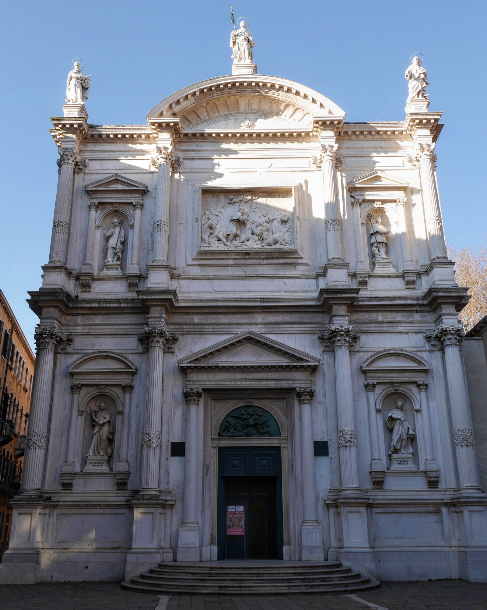 Chiesa di San Rocco : The facade is embellished with statues, with a central relief depicting St. Roch healing the plague-stricken