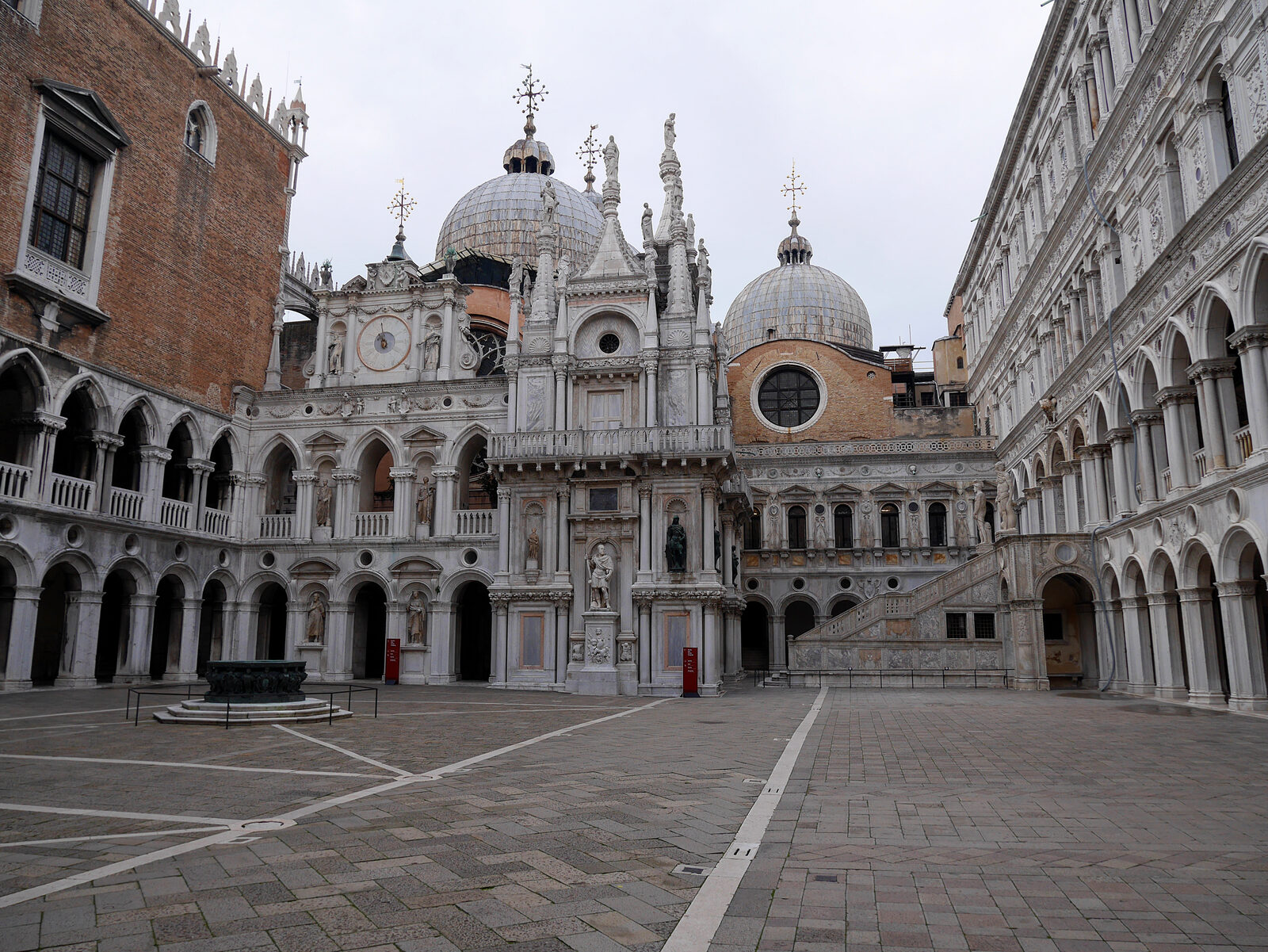 Doge's Palace : The palace courtyard with the St. Mark's Basilica cupolas visible in the background