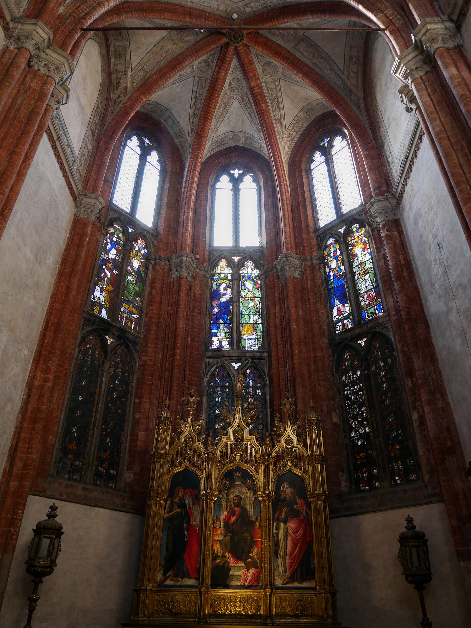 Frari Basilica : In the Chapel of St. Mark, the patron saint of Venice is portrayed seated majestically on a throne