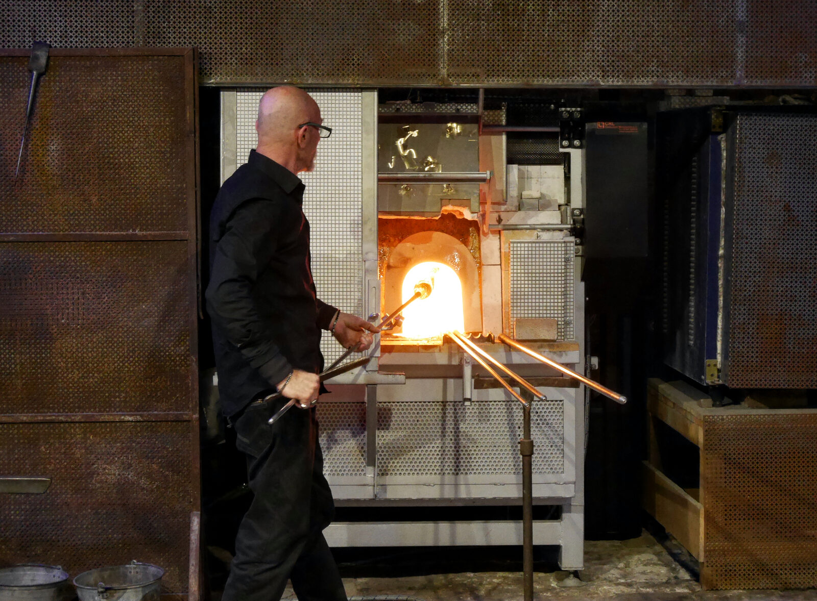 Glass Cathedral : The process begins with raw materials being transformed into molten glass at temperatures exceeding 1,000 °C (2,000 °F)