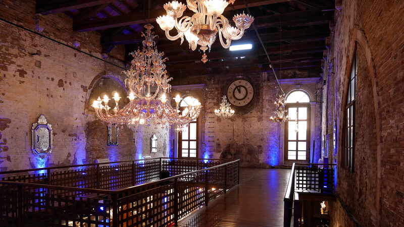 Glass Cathedral : The former church's interior has been transformed into an elegant event space, highlighted by glass chandeliers