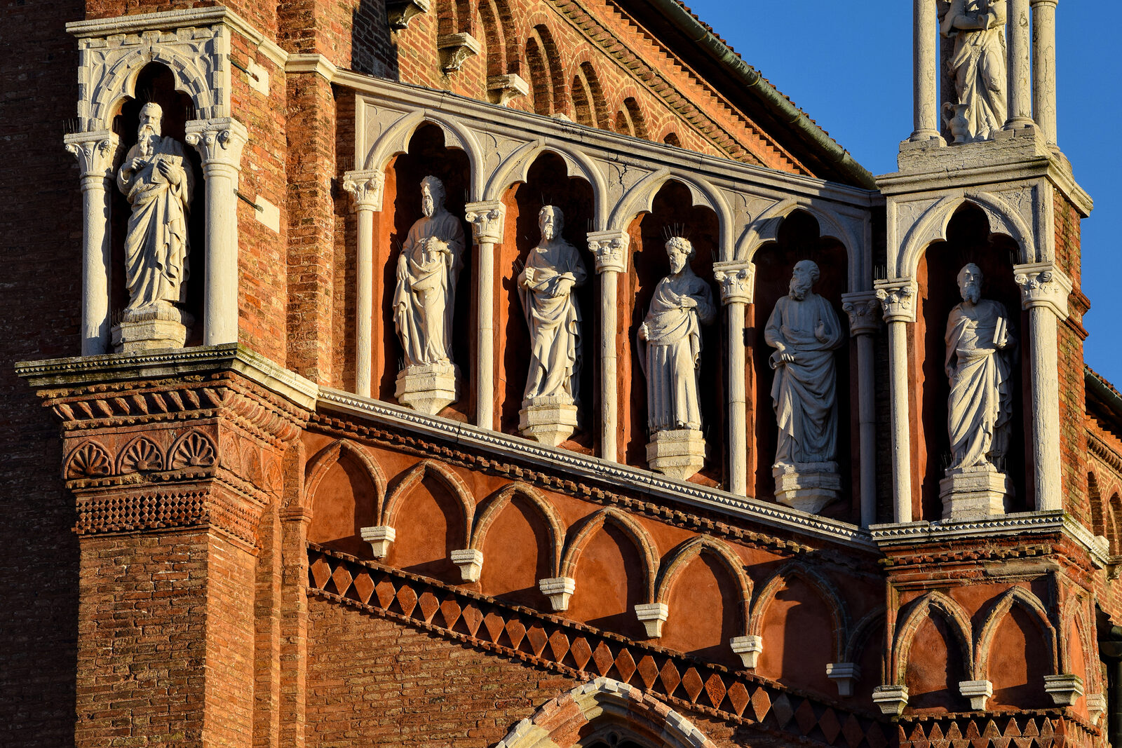 Madonna dell'Orto : Statues of the Apostles are among the numerous intricate details found in the facade