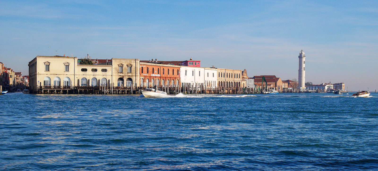 Murano : You'll know you're approaching Murano when you see the iconic white lighthouse