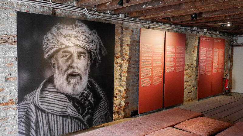 Palazzo Fortuny : Upon entering the museum, you are greeted by a photograph of Mariano Fortuny  alongside biographical panels