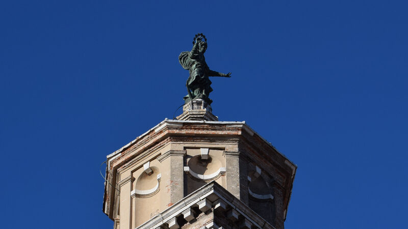 Santa Maria dei Carmini : The 66m (217ft) belltower with the bronze statue of the Virgin of Mount Carmel