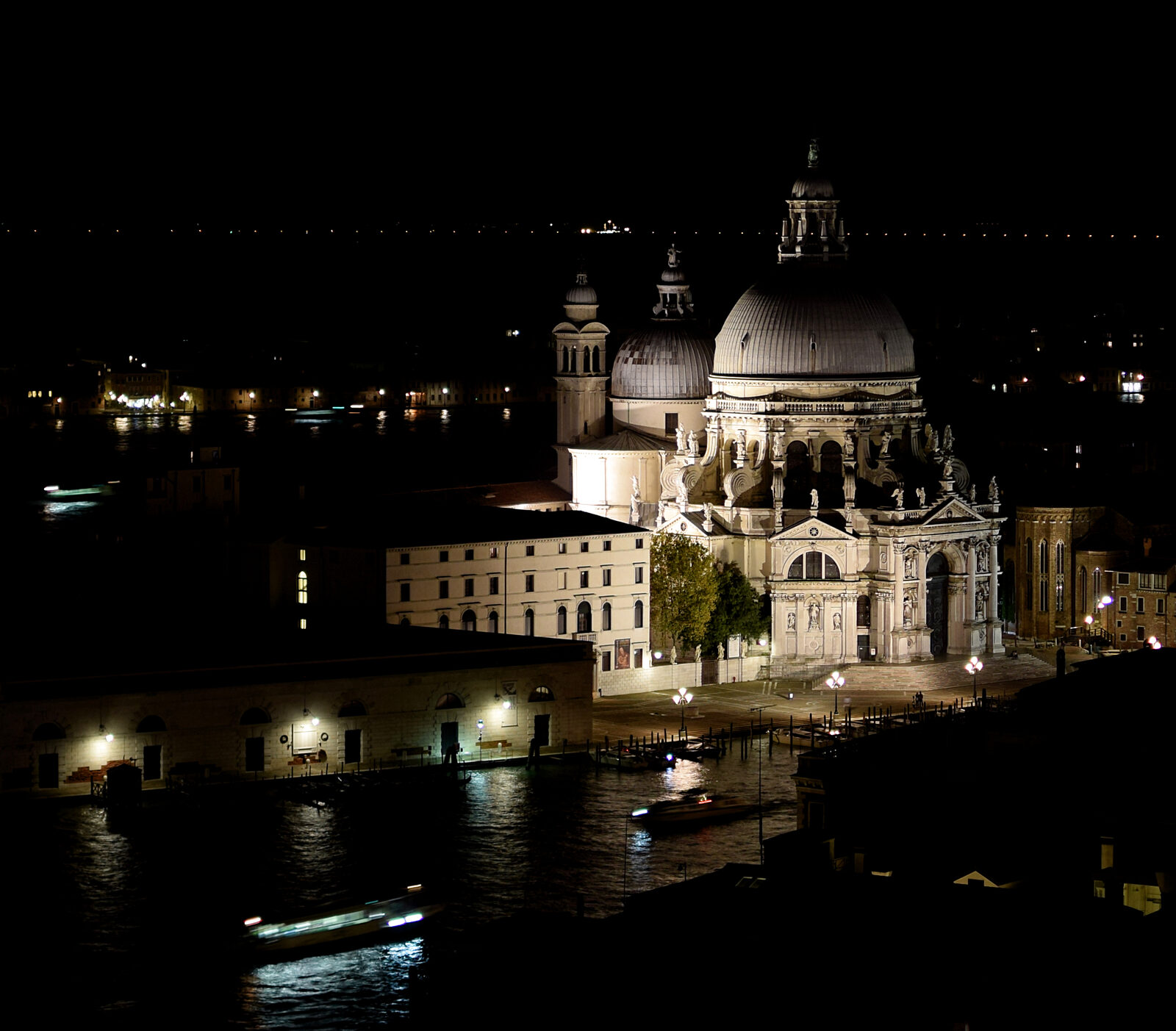 Santa Maria della Salute : Looking down from Campanile di San Marco at night, it’s as if Venice goes dark and the basilica alone remains lit