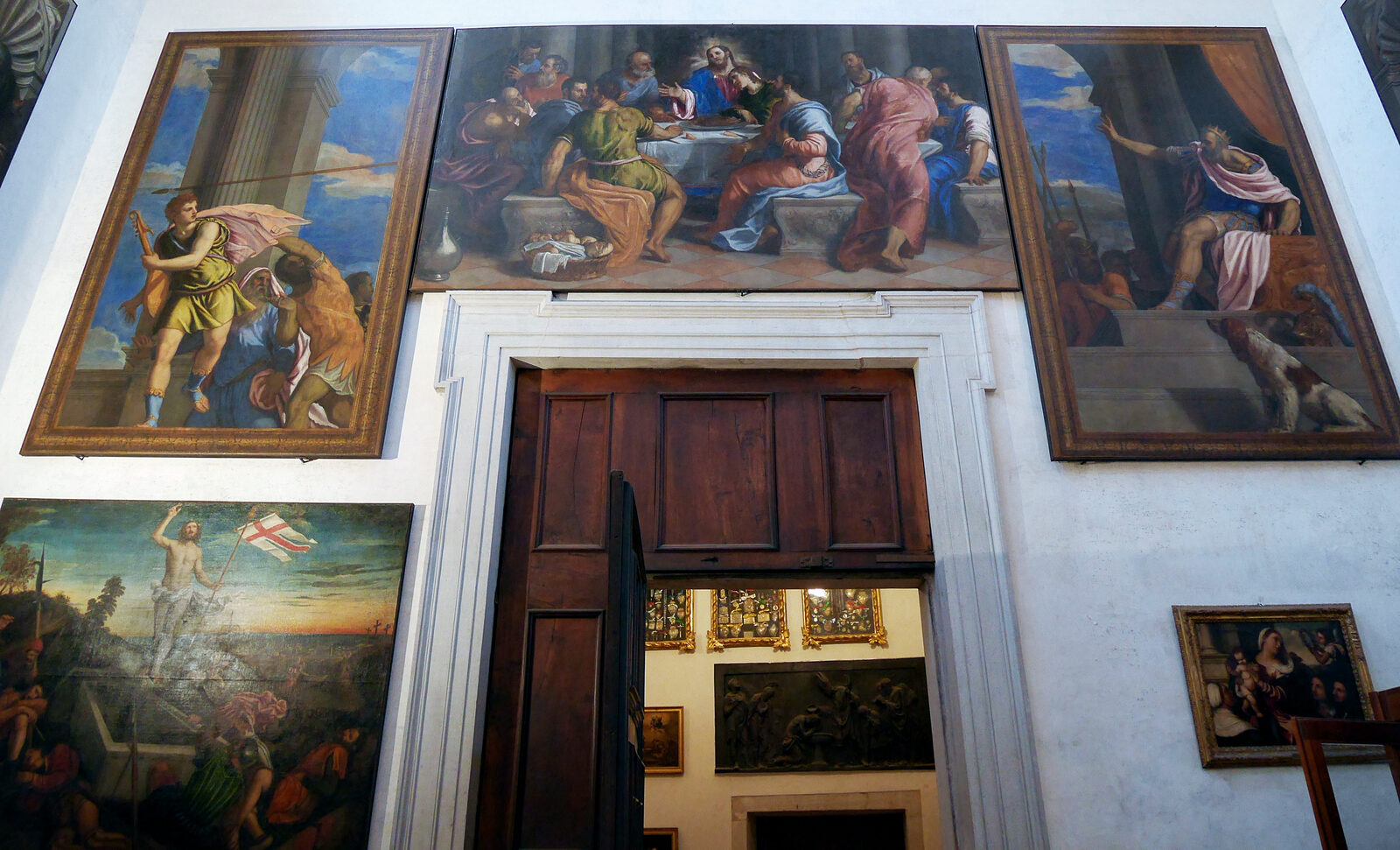 Santa Maria della Salute : Or turn around to see the five paintings on the wall by the entrance to the sacristy