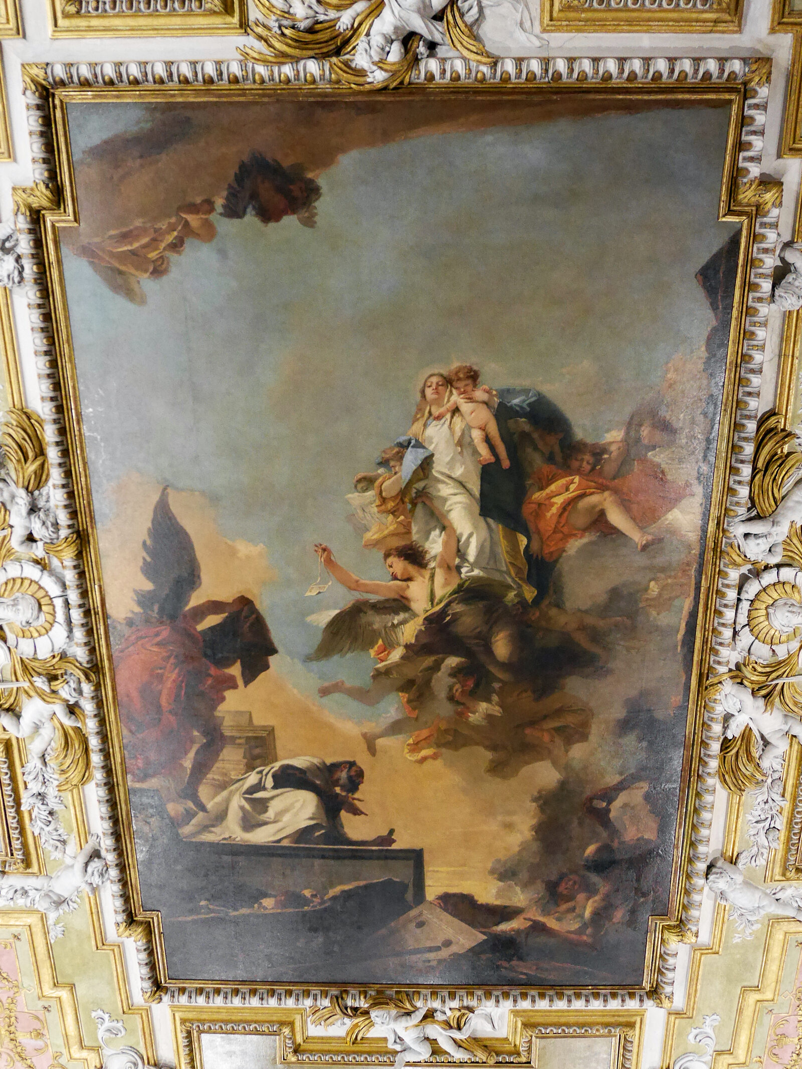 Scuola dei Carmini : The centerpiece of the hall's ceiling is 'The Virgin handing the Scapular to Saint Simon Stock' by Tiepolo (1749)