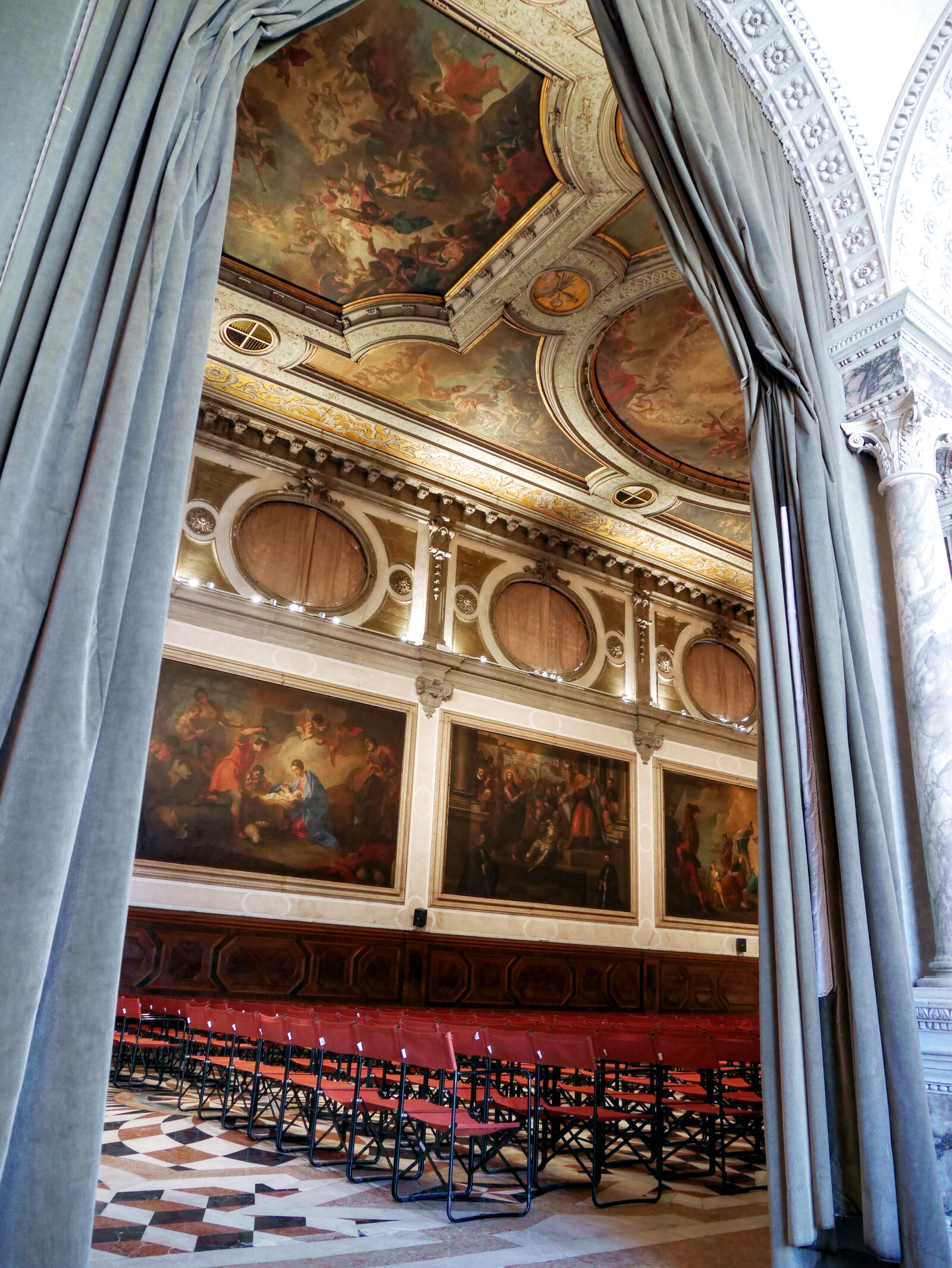 Scuola Grande San Giovanni : Turn around and gasp in awe as the portal to the Chapter Hall offers your first glimpse of its remarkable interior