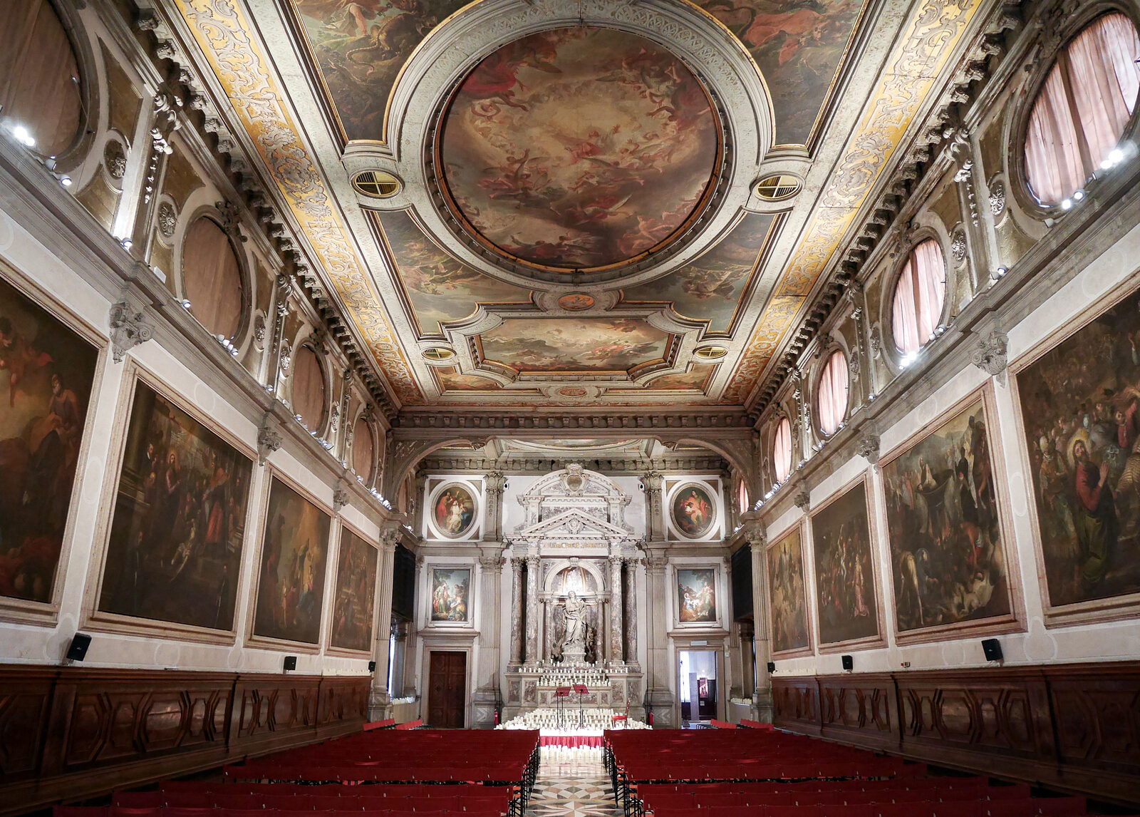 Scuola Grande San Giovanni : The monumental Chapter Hall welcomes you with a unique display of grandeur and beautiful paintings