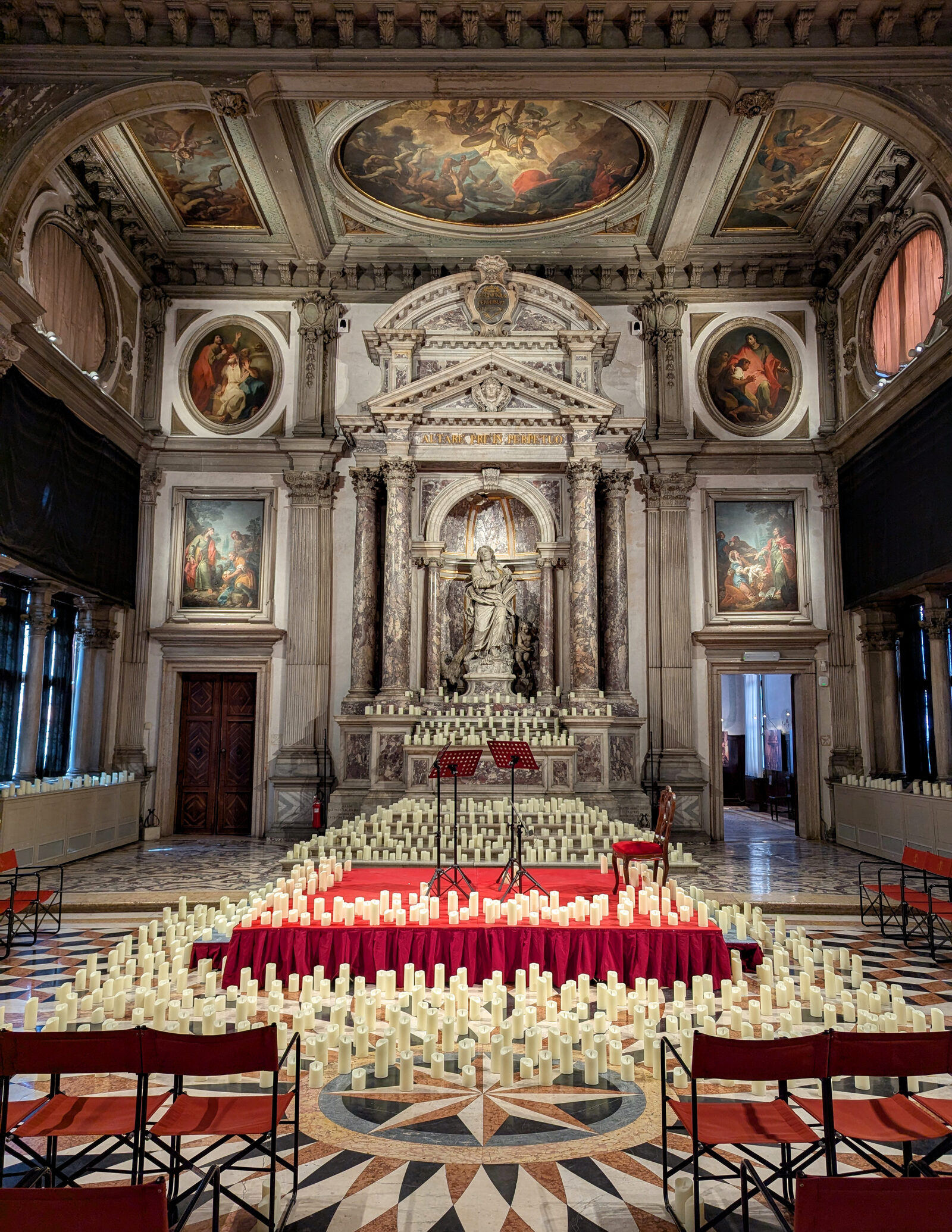 Scuola Grande San Giovanni : The statue at the western end of the Chapter Room depicts St. John the Apostle, the patron saint of the Scuola