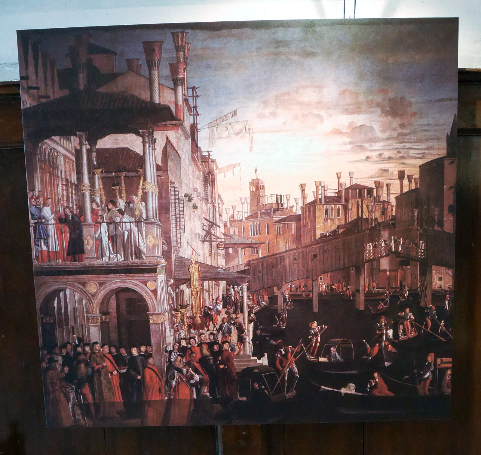 Scuola Grande San Giovanni : Or 'Miracle of the Cross at the Ponte di Rialto' by Vittore Carpaccio shows an earlier wooden iteration of the Rialto Bridge