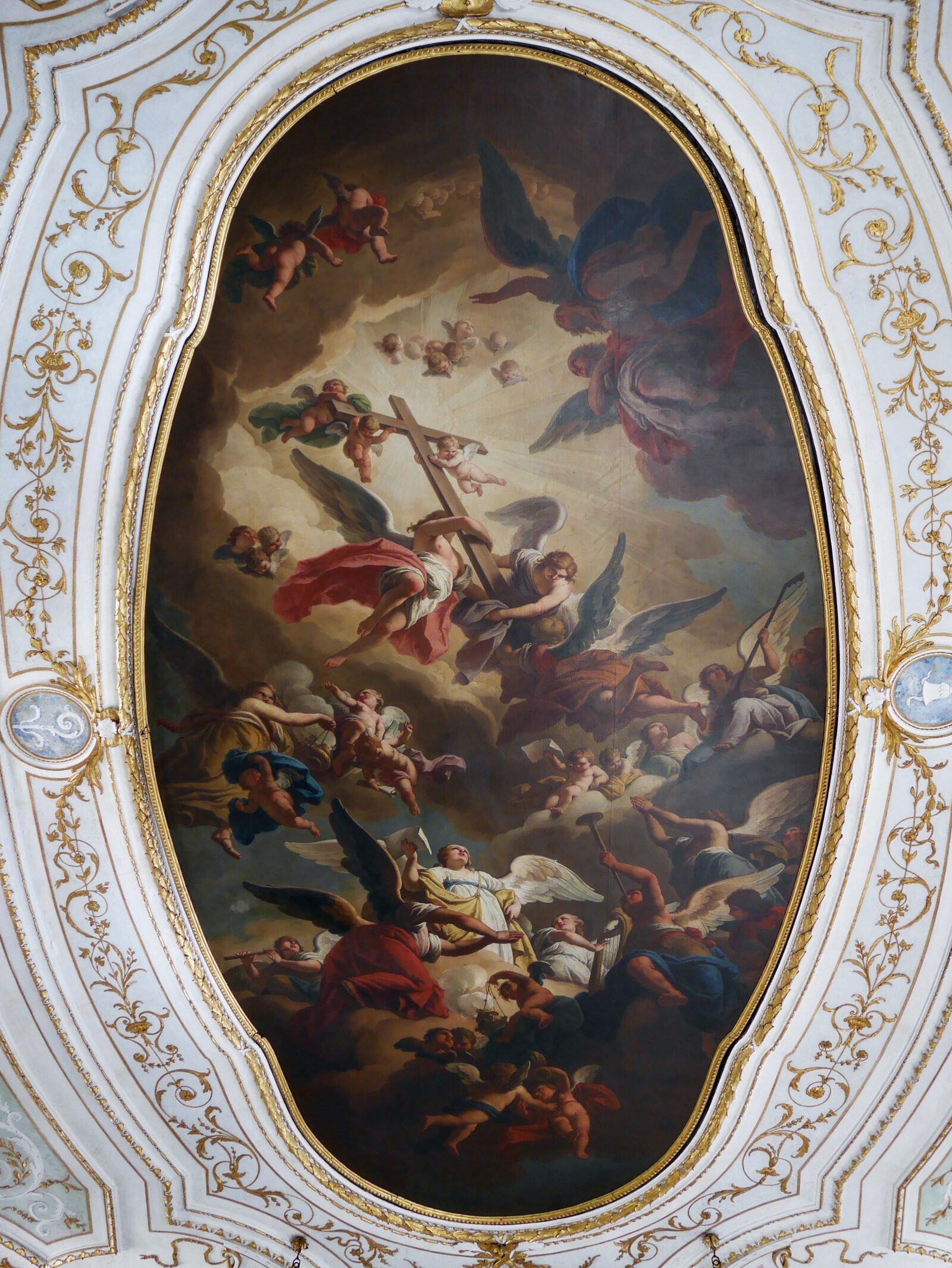 Scuola Grande San Giovanni : On the ceiling, gilded stuccoes surround the central canvas: 'The Triumph of the Cross' by Francesco Maggiotto