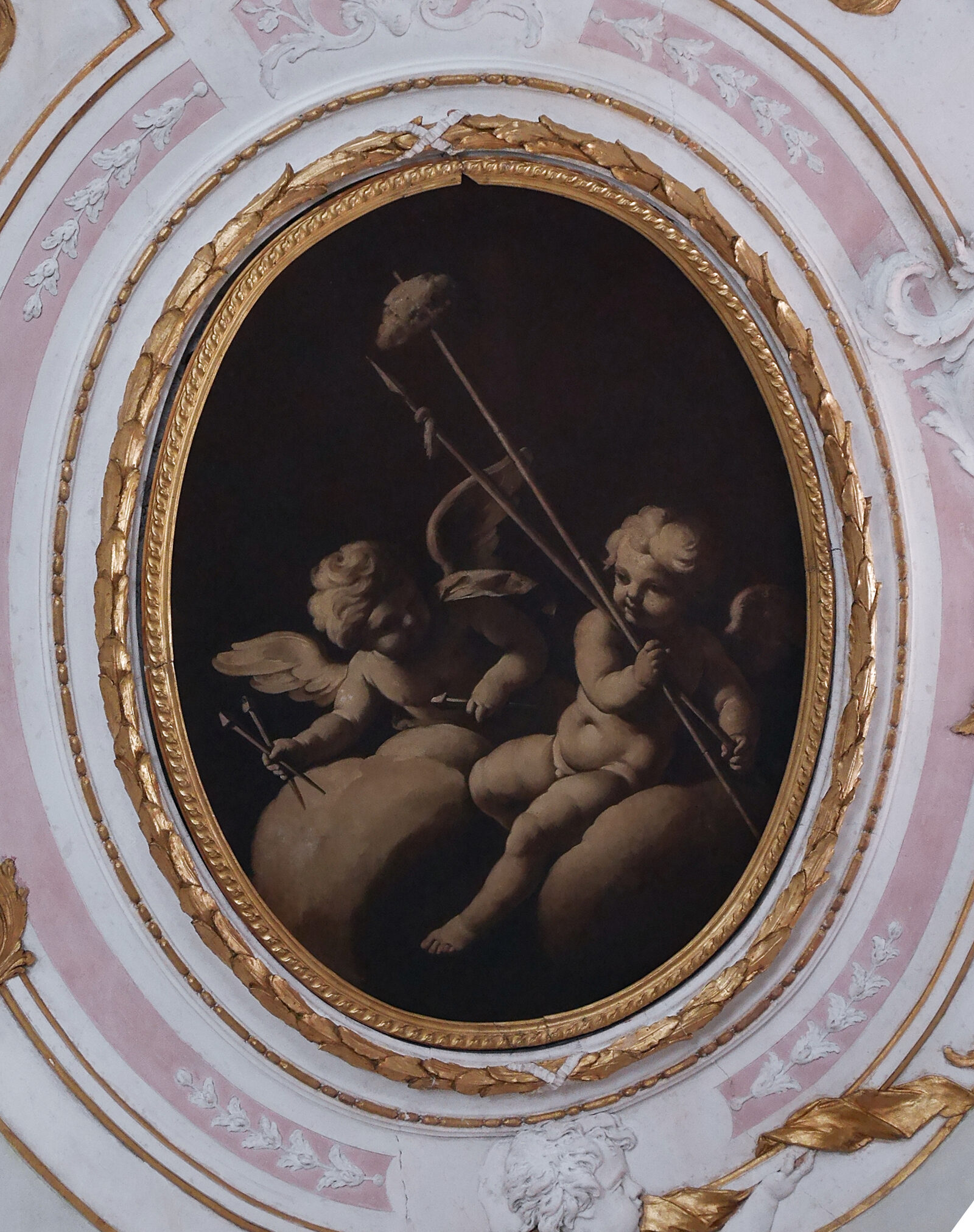 Scuola Grande San Giovanni : Monochrome paintings featuring cherubs adorn the four medallions in the corners of the ceiling