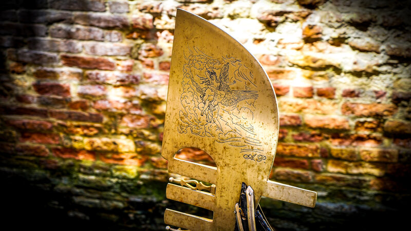 Squero di San Trovaso : The ornament on the front of the boat ('ferro' - Italian for iron) serves also a practical purpose: offsetting the gondolier's weight