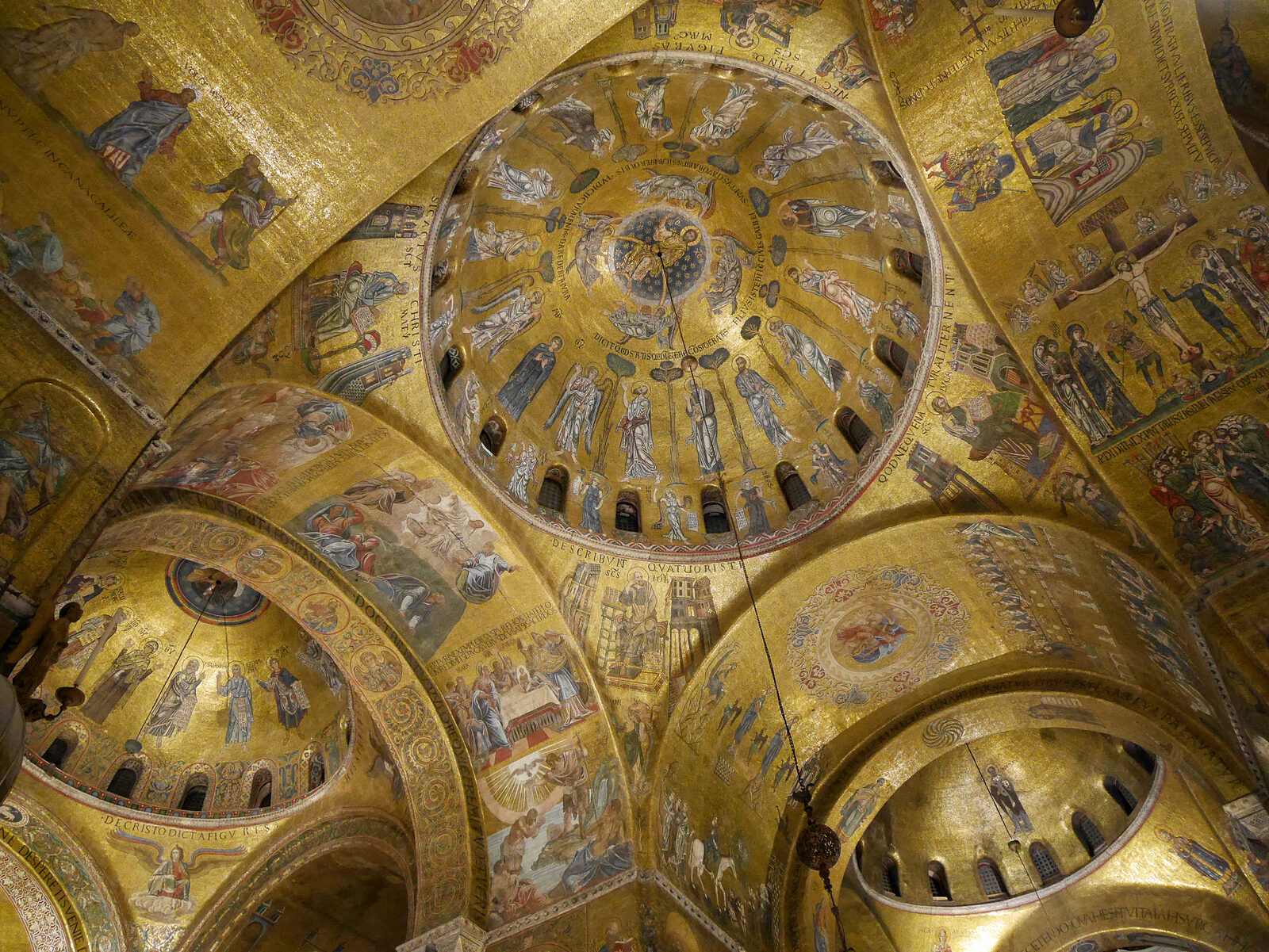 St. Mark's Basilica : Lose yourself in the endless biblical tales shimmering across the gilded mosaics of the celestial upper part