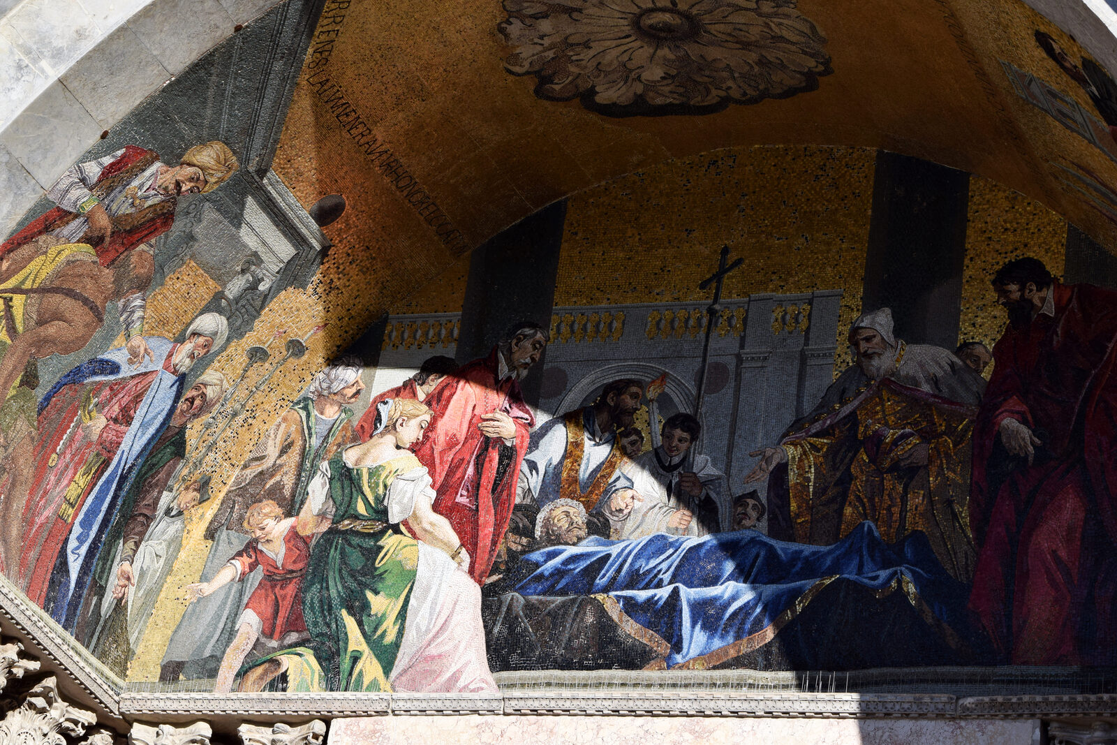 St. Mark's Basilica : The mosaic on a portal facing Piazza San Marco depicts the arrival of St. Mark's body in Venice