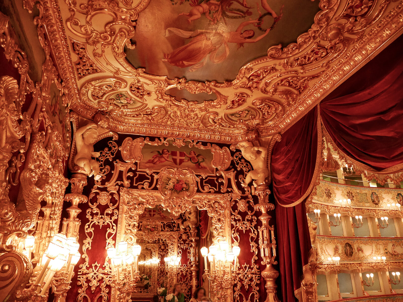 Teatro La Fenice : Extremely lush and featuring mirrors that create the illusion of endless space, the royal box was first created under Napoleon’s orders by merging six standard boxes into this special one