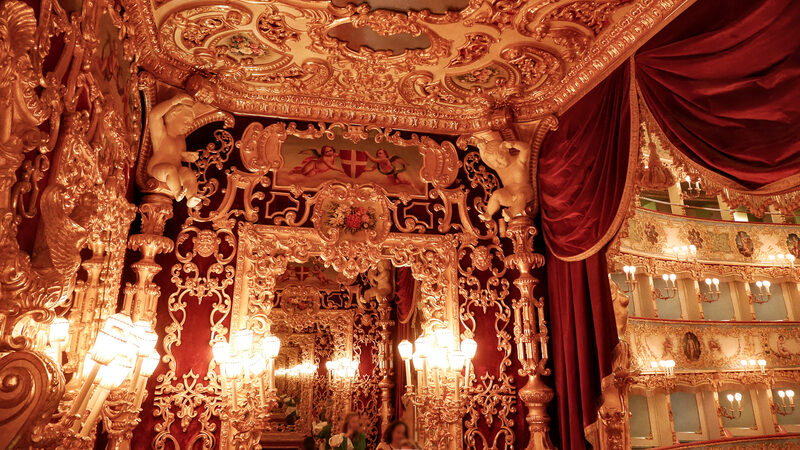 Teatro La Fenice : Extremely lush and featuring mirrors that create the illusion of endless space, the royal box was first created under Napoleon’s orders by merging six standard boxes into this special one