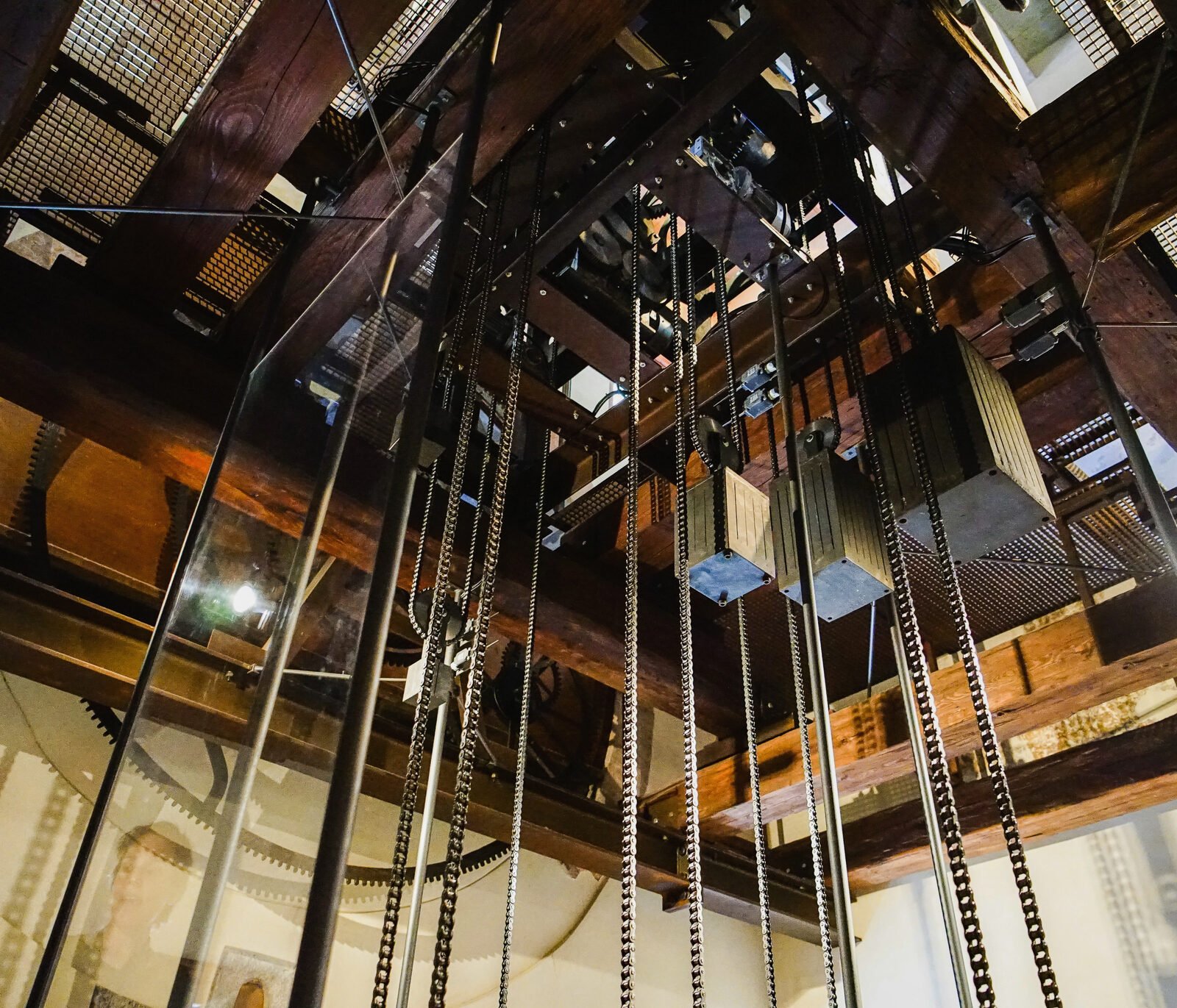 Torre dell'Orologio : Looking up, you can see where the chains holding the weights originate