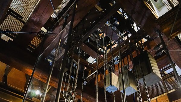 Torre dell'Orologio : Looking up, you can see where the chains holding the weights originate