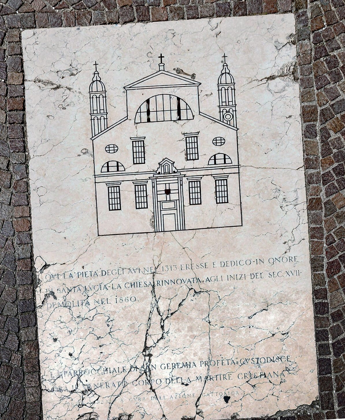 Train Station : In front of the train station, there is a memorial plaque marking the former location of the Santa Lucia church