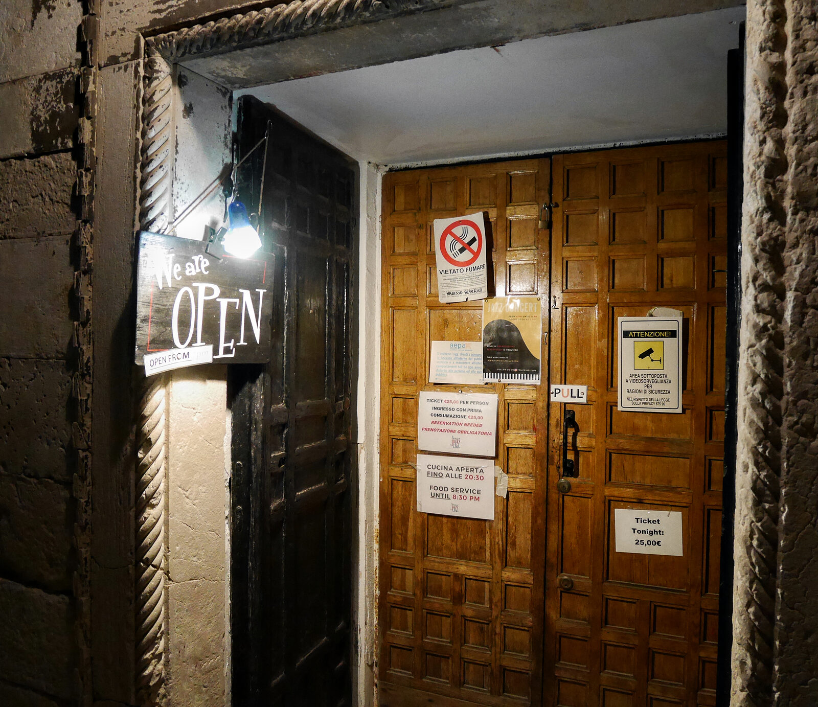 Venice Jazz Club : The unassuming entrance you spotted while wandering through Dorsoduro during the day, leaving you curious about what hides behind it